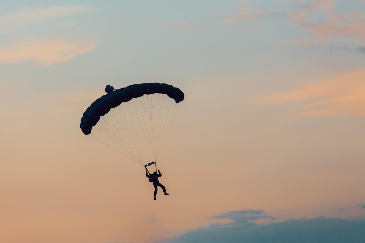 Parachuting Sport in Sunset Sky