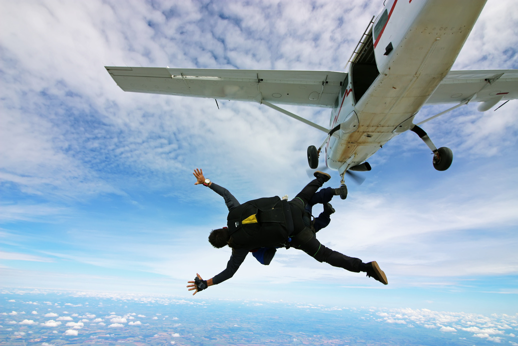 Skydiving tandem jump out of plane